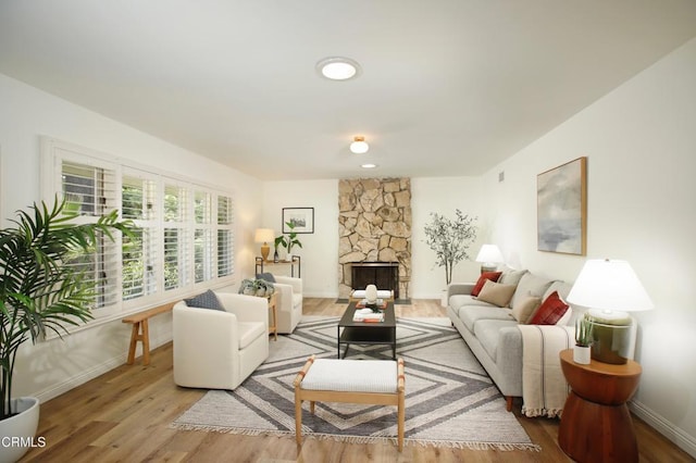 3628 El Caminito Ln, Crescenta, CA 91214 - living room with wood finished floors and a stone fireplace