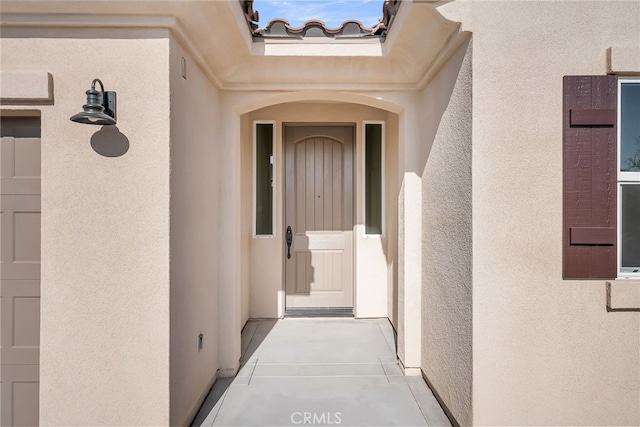 7444 Desert Sky Dr, Yucca Valley, CA 92284 - property entrance with stucco siding
