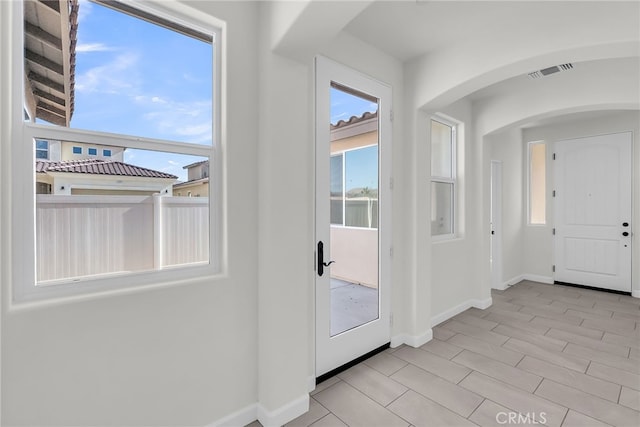 7444 Desert Sky Dr, Yucca Valley, CA 92284 - foyer entrance with baseboards and arched walkways