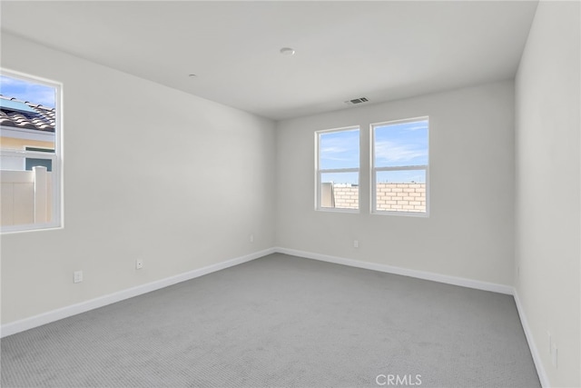 7444 Desert Sky Dr, Yucca Valley, CA 92284 - carpeted spare room featuring baseboards