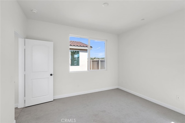 7444 Desert Sky Dr, Yucca Valley, CA 92284 - unfurnished room featuring carpet and a smoke detector