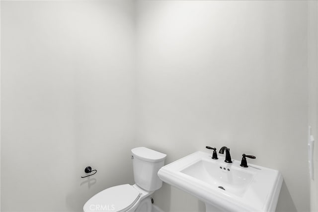 7444 Desert Sky Dr, Yucca Valley, CA 92284 - half bath featuring toilet and a sink