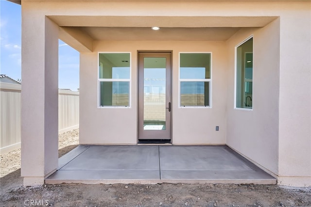 7444 Desert Sky Dr, Yucca Valley, CA 92284 - entrance to property featuring a patio area and stucco siding