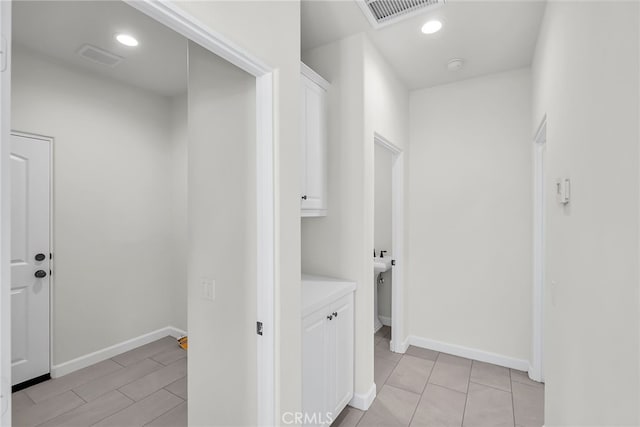 7444 Desert Sky Dr, Yucca Valley, CA 92284 - washroom featuring baseboards and recessed lighting