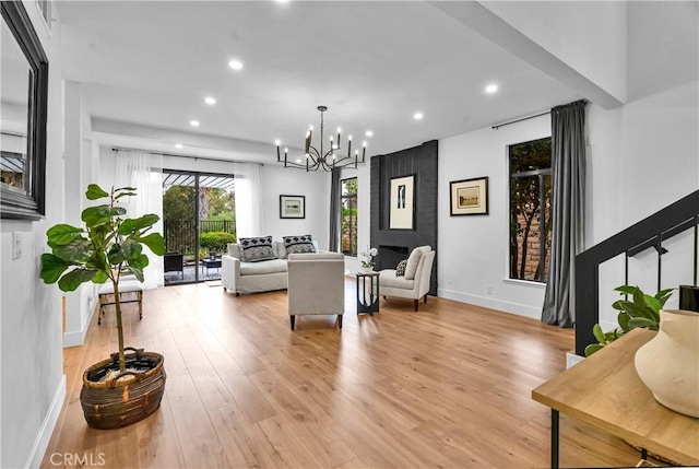 1059 Hillview Cir, Simi Valley, CA 93065 - living area with recessed lighting, light wood-type flooring, and a chandelier