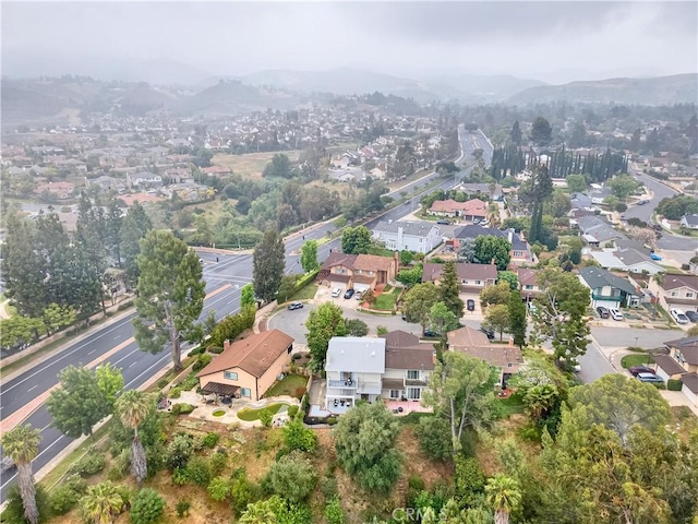 1059 Hillview Cir, Simi Valley, CA 93065 - aerial view of property and surrounding area featuring a mountain backdrop and nearby suburban area