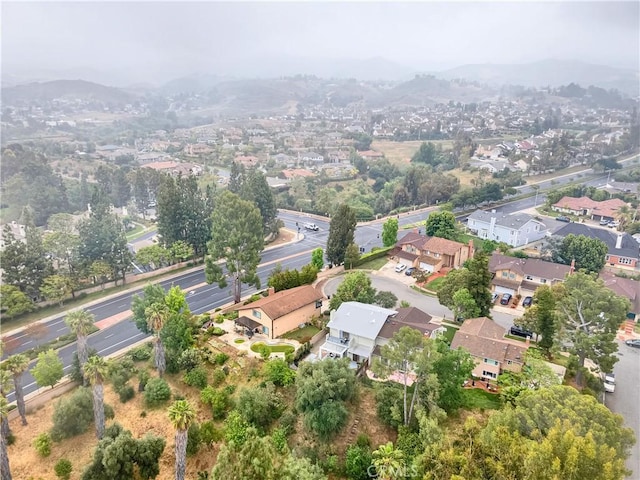 1059 Hillview Cir, Simi Valley, CA 93065 - aerial overview of property's location featuring mountains and nearby suburban area