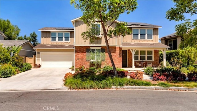 103 Sabiosa, Irvine, CA 92618 - traditional-style house featuring covered porch, solar panels, board and batten siding, concrete driveway, and a garage