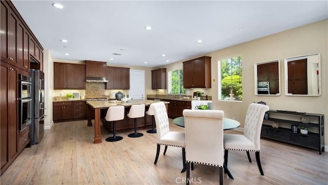 103 Sabiosa, Irvine, CA 92618 - dining space featuring light wood-style floors and recessed lighting