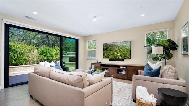 103 Sabiosa, Irvine, CA 92618 - living room with light wood-type flooring and recessed lighting