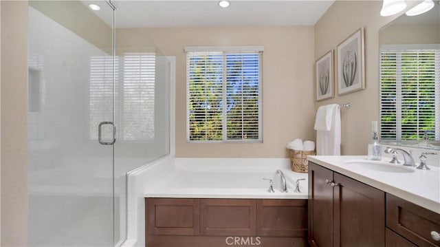 103 Sabiosa, Irvine, CA 92618 - bathroom featuring vanity, a shower stall, a bath, and recessed lighting