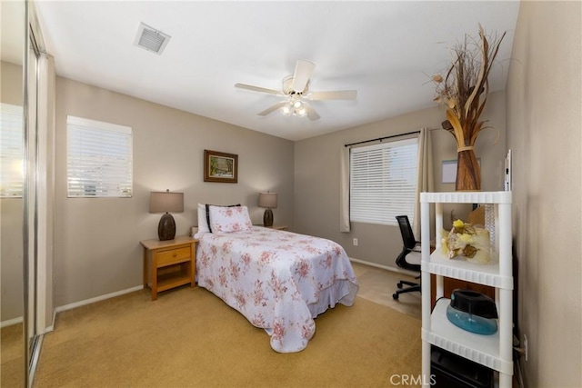 13161 Mugu Ct, Apple Valley, CA 92308 - bedroom featuring light carpet and ceiling fan
