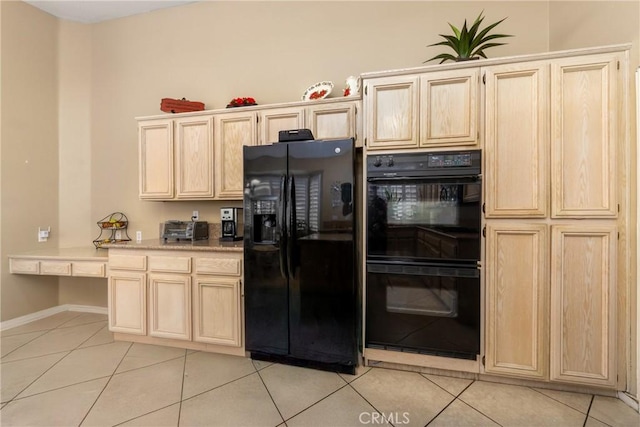 13161 Mugu Ct, Apple Valley, CA 92308 - kitchen featuring black appliances, light brown cabinetry, and light tile patterned flooring