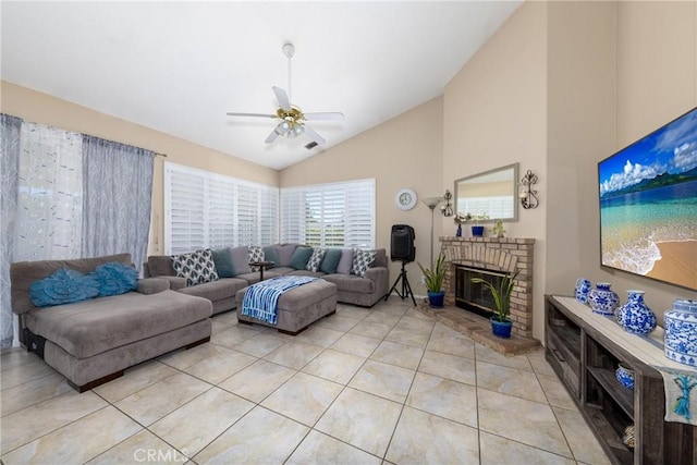 13161 Mugu Ct, Apple Valley, CA 92308 - living room with lofted ceiling, light tile patterned flooring, a brick fireplace, and ceiling fan