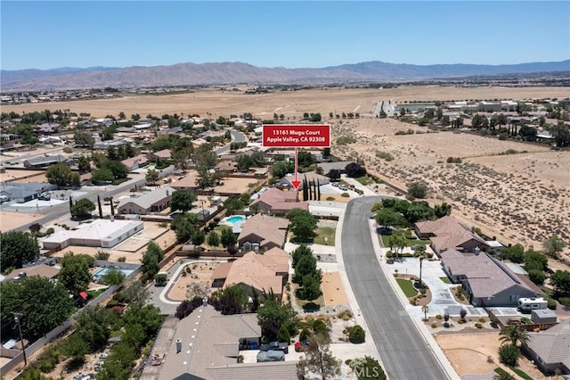 13161 Mugu Ct, Apple Valley, CA 92308 - aerial view of residential area with a mountain backdrop