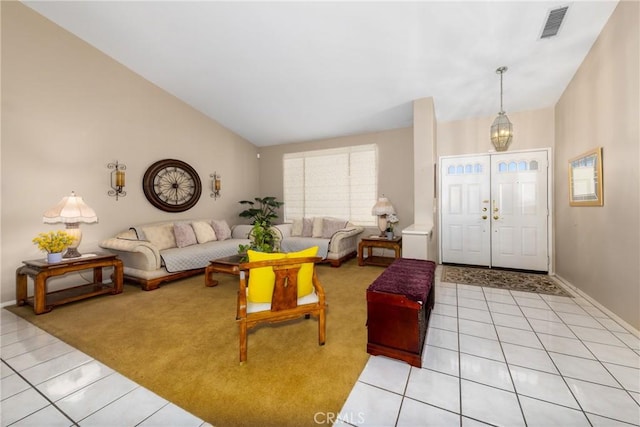 13161 Mugu Ct, Apple Valley, CA 92308 - living room with light tile patterned floors and vaulted ceiling