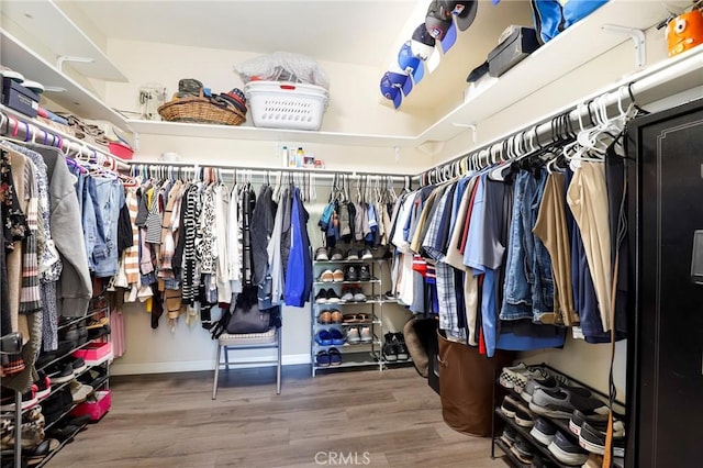20000 Plum Canyon Rd Unit 1827, Saugus, CA 91350 - walk in closet featuring wood finished floors