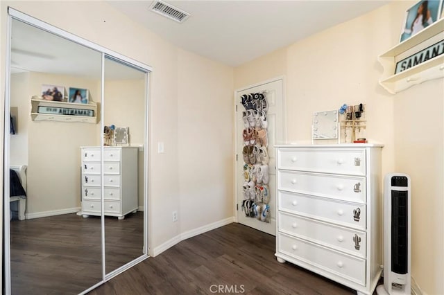 20000 Plum Canyon Rd Unit 1827, Saugus, CA 91350 - bedroom with dark wood-type flooring and a closet
