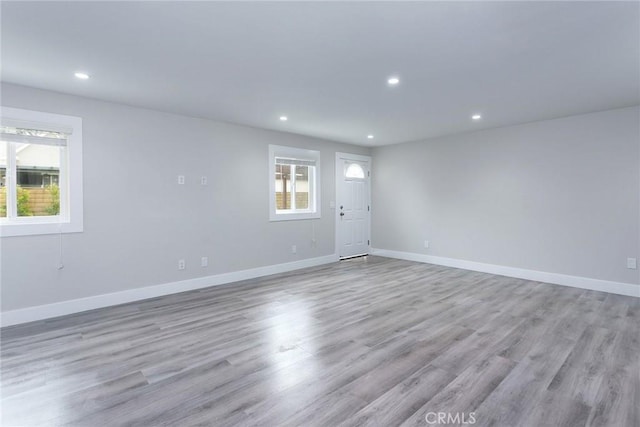 783 E Grand Ave, Pomona, CA 91766 - empty room featuring plenty of natural light, recessed lighting, and light wood-style floors
