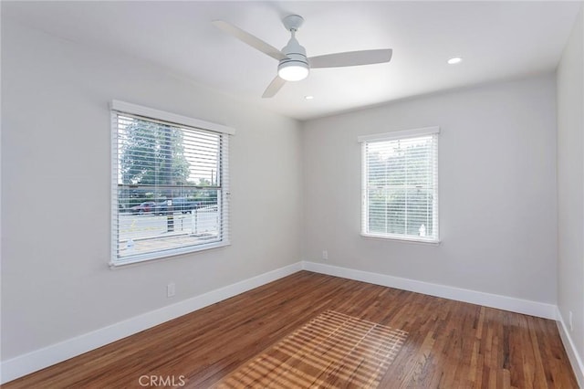 783 E Grand Ave, Pomona, CA 91766 - empty room with healthy amount of natural light, wood finished floors, and a ceiling fan