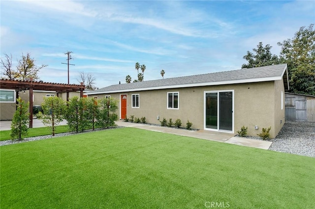 783 E Grand Ave, Pomona, CA 91766 - rear view of property featuring stucco siding, a pergola, a yard, and a patio