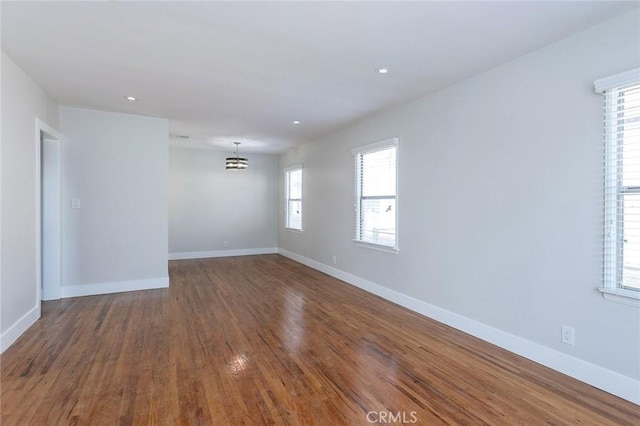 783 E Grand Ave, Pomona, CA 91766 - spare room with wood finished floors and recessed lighting