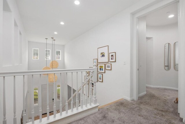 17236 Eagle Canyon Way, San Diego, CA 92127 - hall with carpet floors, an upstairs landing, recessed lighting, and healthy amount of natural light