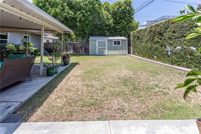 15713 Tuba St, North Hills, CA 91343 - fenced backyard with a storage shed and a patio area