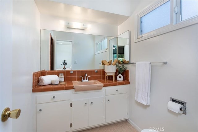 15713 Tuba St, North Hills, CA 91343 - bathroom featuring vanity and backsplash