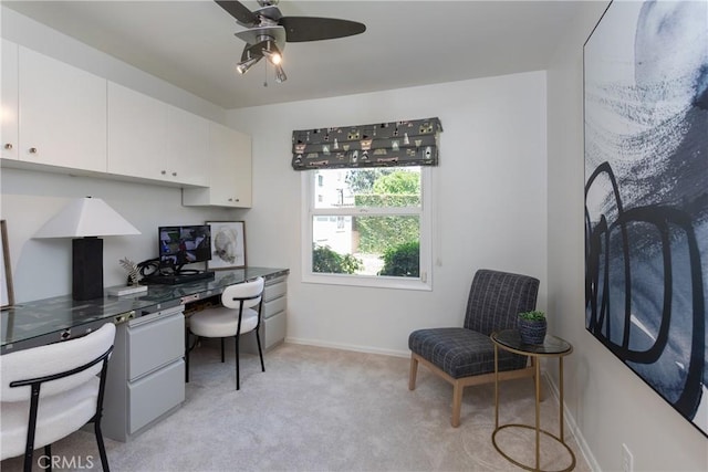 15713 Tuba St, North Hills, CA 91343 - office space with built in desk, a ceiling fan, and light carpet