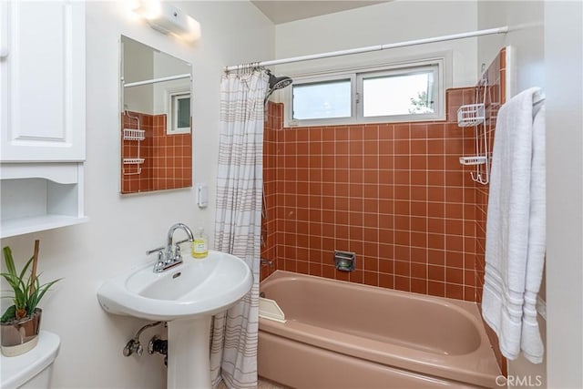 15713 Tuba St, North Hills, CA 91343 - bathroom featuring shower / bath combo with shower curtain and toilet