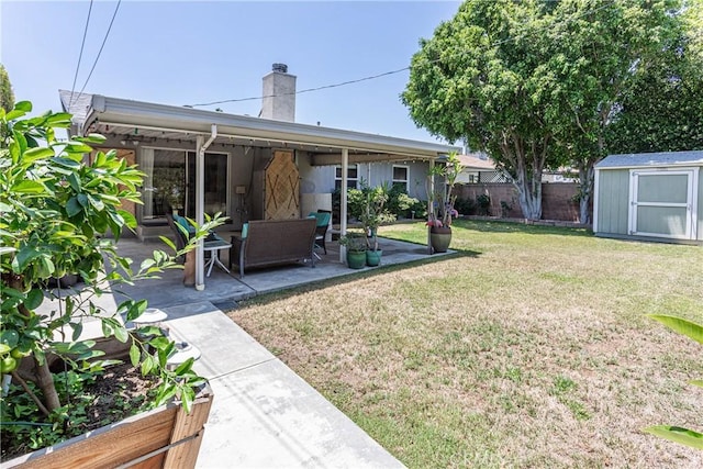 15713 Tuba St, North Hills, CA 91343 - view of yard featuring a patio area and a storage shed