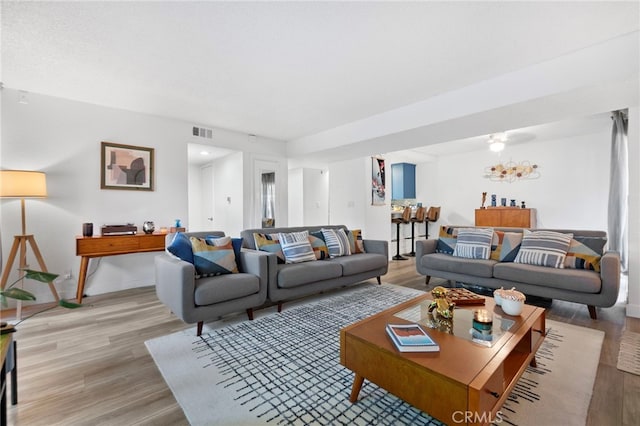 1110 Ohio Ave Unit 107, Long Beach, CA 90804 - living room featuring light wood finished floors