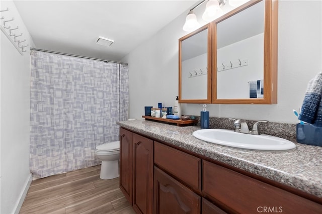 1110 Ohio Ave Unit 107, Long Beach, CA 90804 - bathroom featuring vanity, wood finished floors, and curtained shower