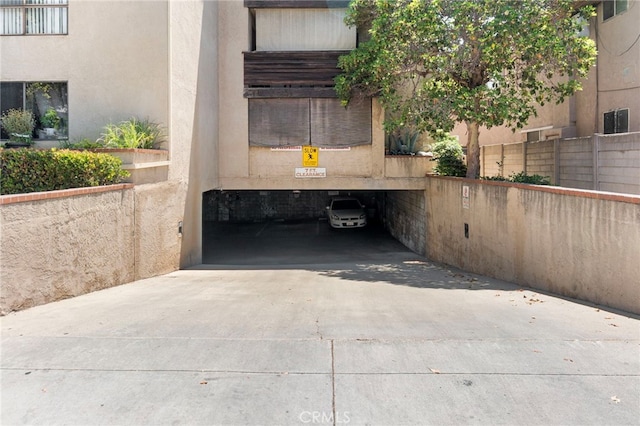 1110 Ohio Ave Unit 107, Long Beach, CA 90804 - view of parking with concrete driveway