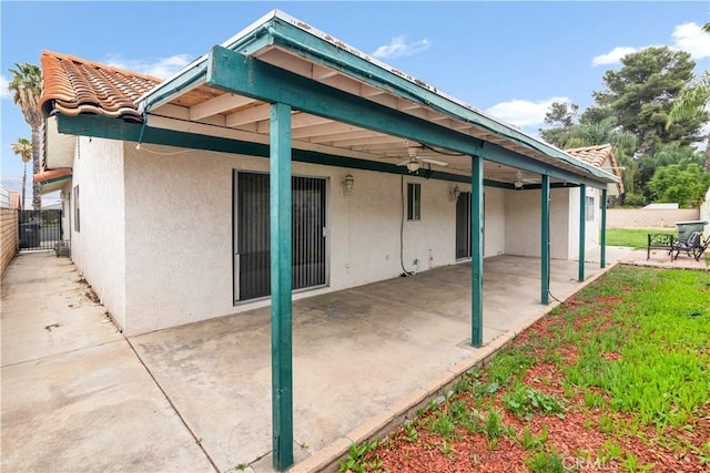 42397 Santiago Dr, Hemet, CA 92544 - back of property with stucco siding, a patio area, a ceiling fan, and a tiled roof