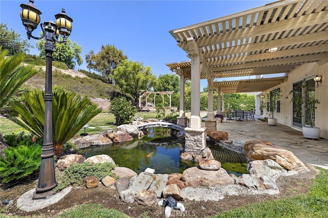 2189 Wind River Ln, Rowland Heights, CA 91748 - view of yard featuring a garden pond, a pergola, and a patio area