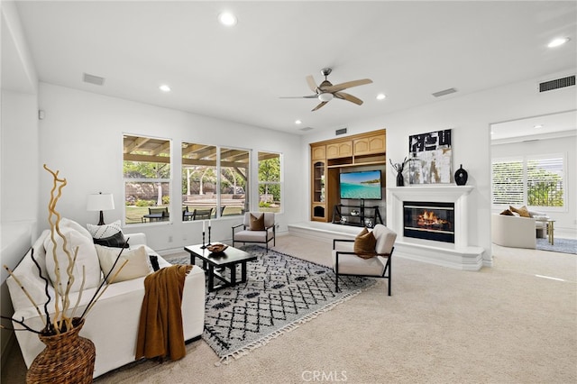 2189 Wind River Ln, Rowland Heights, CA 91748 - living area featuring carpet flooring, recessed lighting, a ceiling fan, and a glass covered fireplace