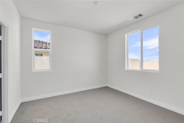 7432 Desert Sky Dr, Yucca Valley, CA 92284 - carpeted spare room featuring baseboards