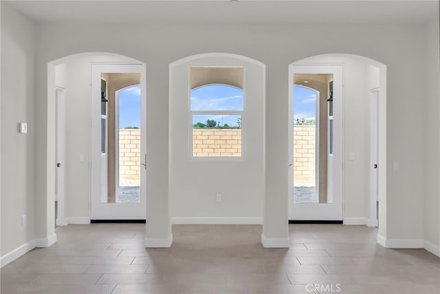 7432 Desert Sky Dr, Yucca Valley, CA 92284 - entrance foyer with arched walkways and tile patterned flooring