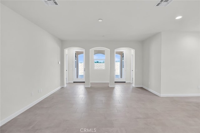 7432 Desert Sky Dr, Yucca Valley, CA 92284 - foyer entrance with arched walkways and recessed lighting