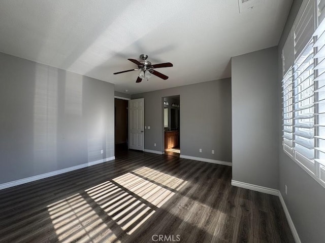 14610 Baylor Ave, Chino, CA 91710 - spare room with dark wood-type flooring and a ceiling fan