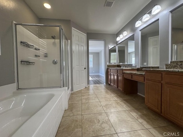 14610 Baylor Ave, Chino, CA 91710 - bathroom featuring a stall shower, vanity, a garden tub, tile patterned floors, and recessed lighting