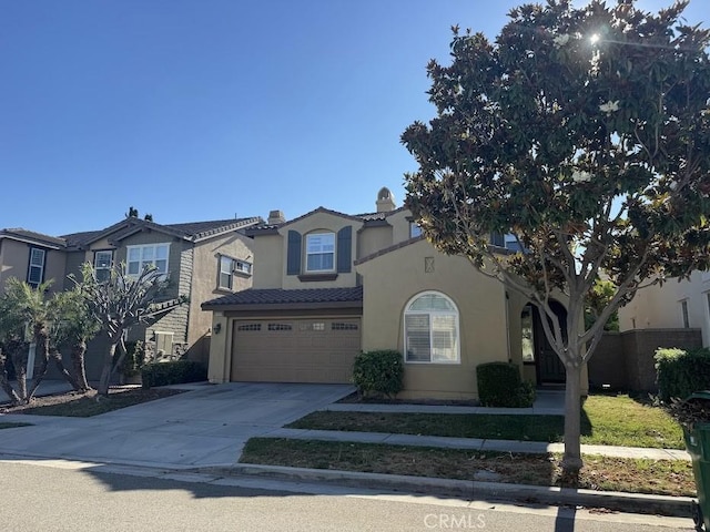 14610 Baylor Ave, Chino, CA 91710 - view of front of home featuring stucco siding, concrete driveway, an attached garage, a tiled roof, and a chimney