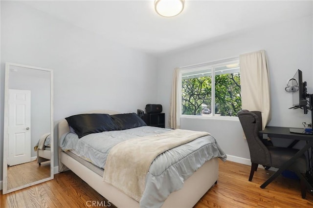 13708 El Espejo Rd, La Mirada, CA 90638 - bedroom featuring wood finished floors and an office area