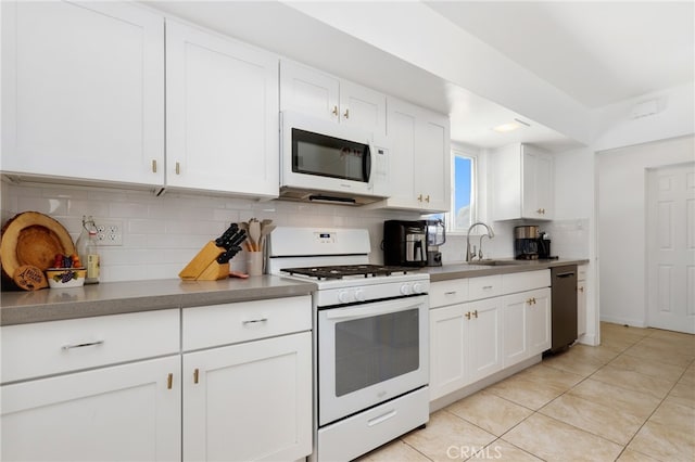 13708 El Espejo Rd, La Mirada, CA 90638 - kitchen with white appliances, decorative backsplash, white cabinets, and light tile patterned flooring