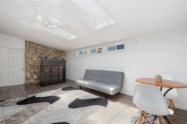 13708 El Espejo Rd, La Mirada, CA 90638 - living area featuring wood finished floors, vaulted ceiling, and a fireplace