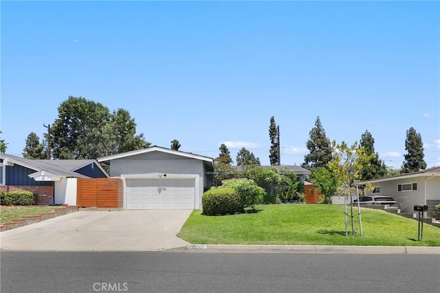 13708 El Espejo Rd, La Mirada, CA 90638 - view of front facade with concrete driveway and a garage