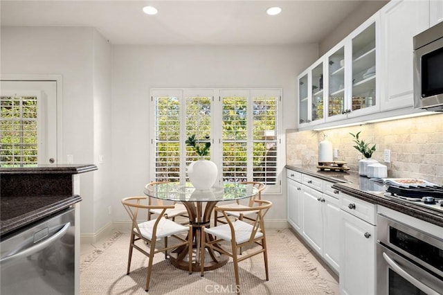 52 Anjou, Newport Coast, CA 92657 - dining space with recessed lighting and light tile patterned floors