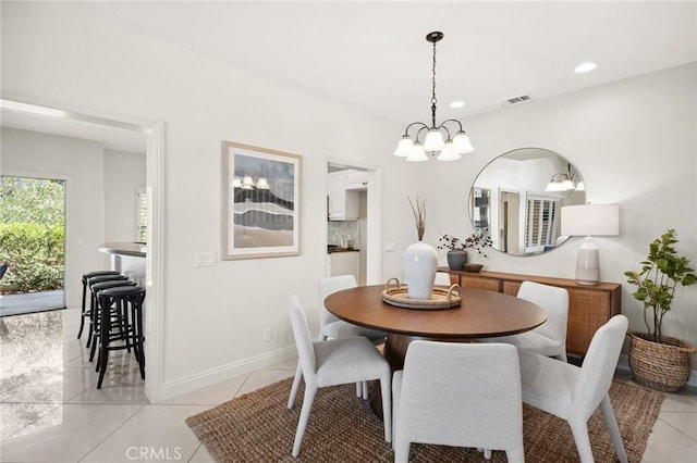 52 Anjou, Newport Coast, CA 92657 - dining room featuring a chandelier, light tile patterned floors, and recessed lighting